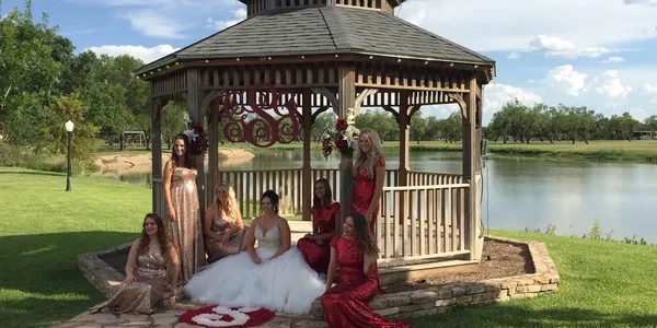 Bride and Bridesmaids on gazebo