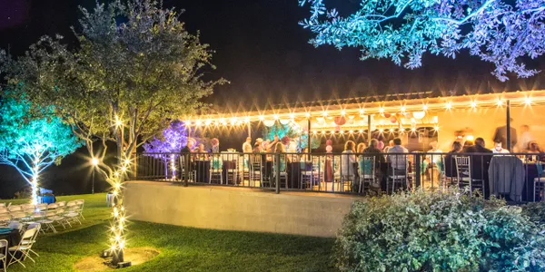 Night photo of party on patio
