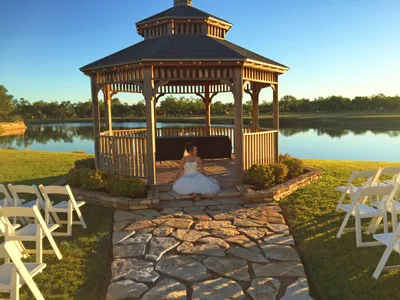 Gazebo on Lake with bride