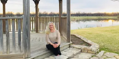 Wedding officiant sitting on gazebo